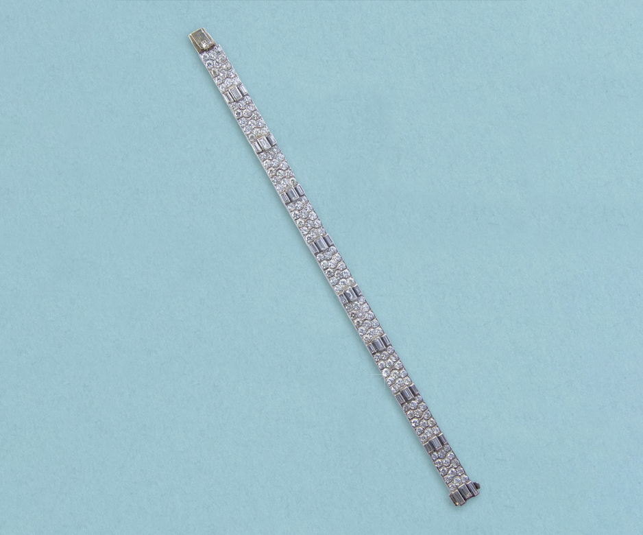 Diamond strap bracelet” brooch